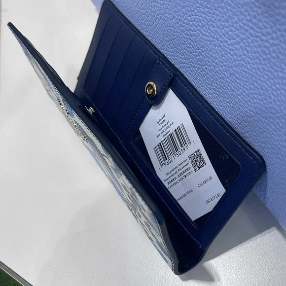 Kate Spade Madison Vase Floral Large Slim Bifold Wallet
Blue Multi
NWT - Picture 11 of 16